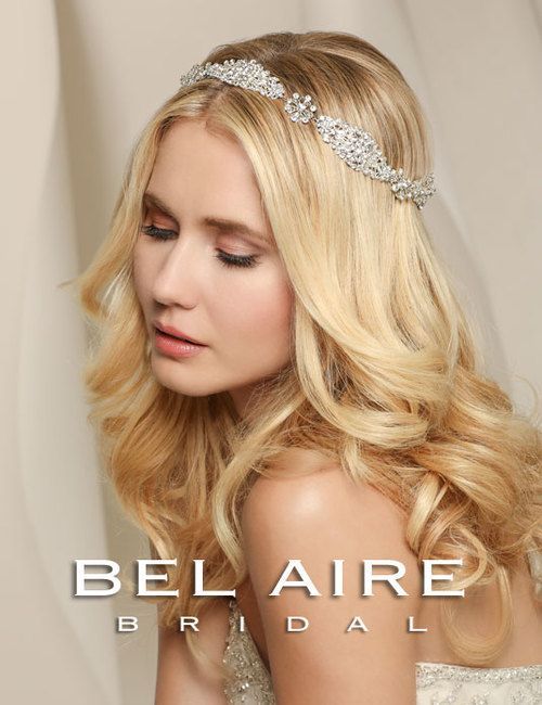 A woman wearing a headband from belaire bridal