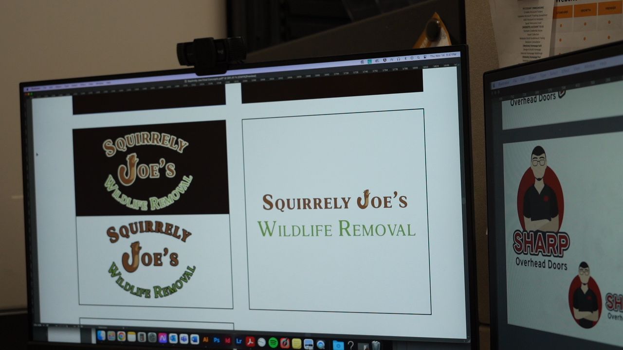 A computer monitor displays a logo for squirrelly joe 's wildlife removal