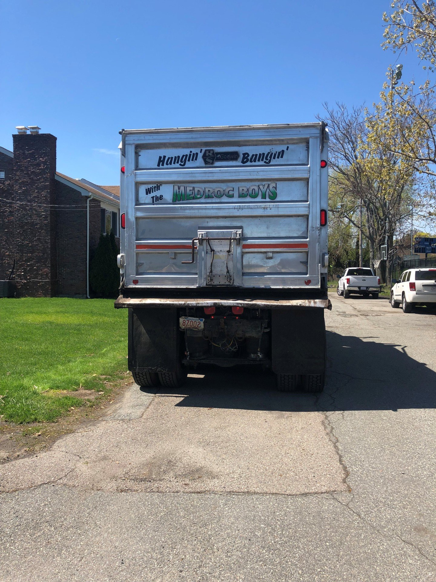 Asphalt Parking Lot — Infront View Of House With Made Of Asphalt Pavement Floor in Medford, MA