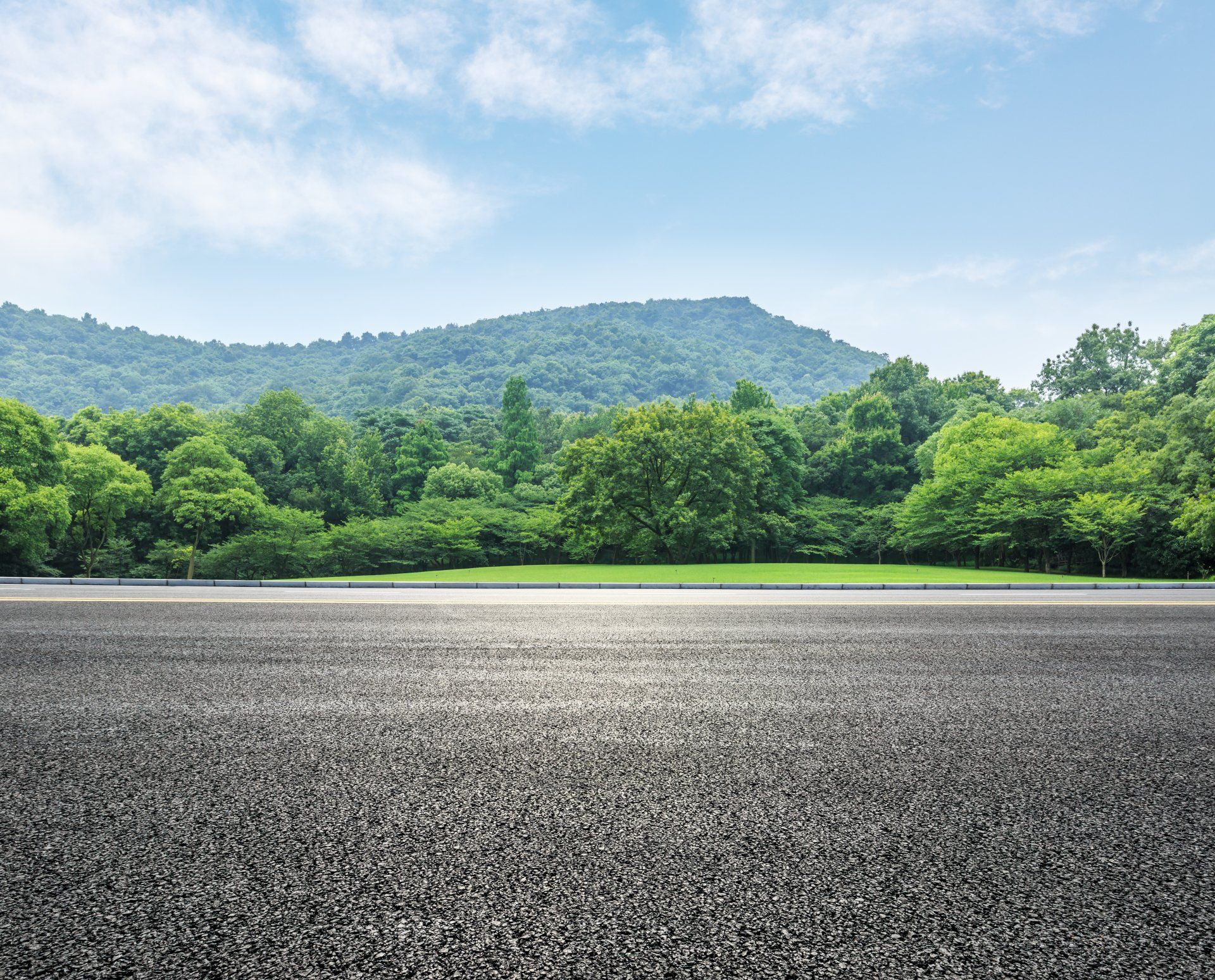 Asphalt Parking Lot — Infront View Of House With Made Of Asphalt Pavement Floor in Medford, MA