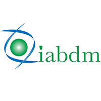 The logo for iabdm is a green and blue logo with a green circle in the middle.