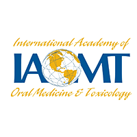 The logo for the international academy of oral medicine and toxicology