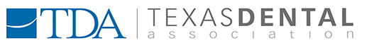 The logo for the texas dental association is blurred