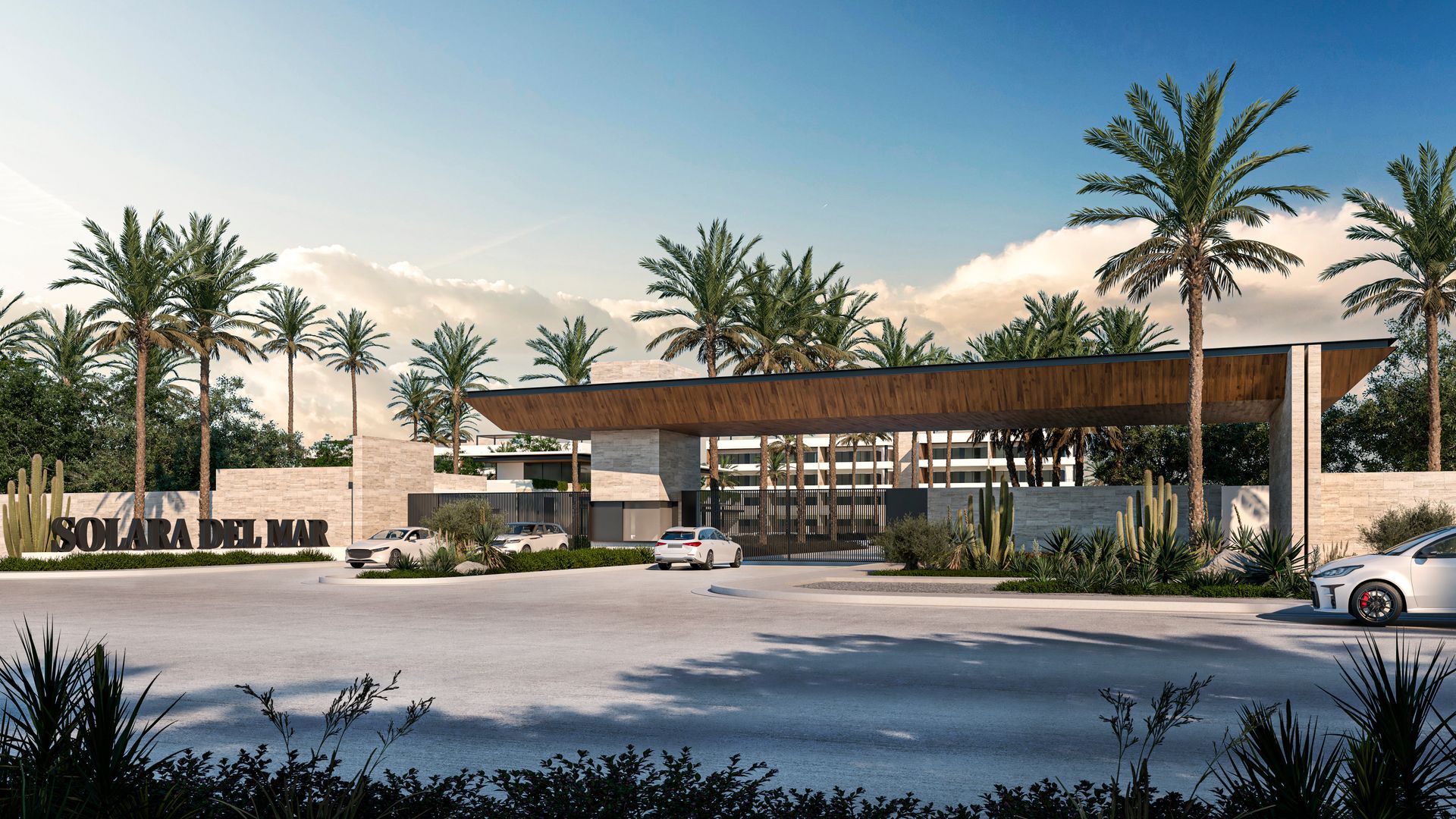 Modern kitchen with black countertops, wood cabinetry, stainless steel appliances, and bar seating.