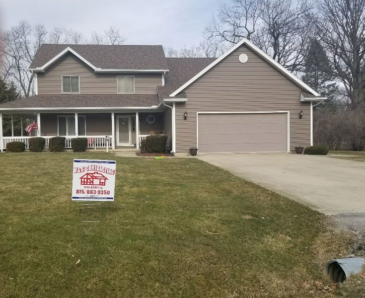 House with For Sale Sign — Oglesby, IL — H & S Contracting Inc.