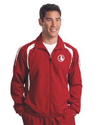 photo of man wearing red sweatsuit with AHHS logo on left chest