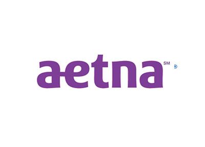 Aetna logo in purple on a white background. The word 