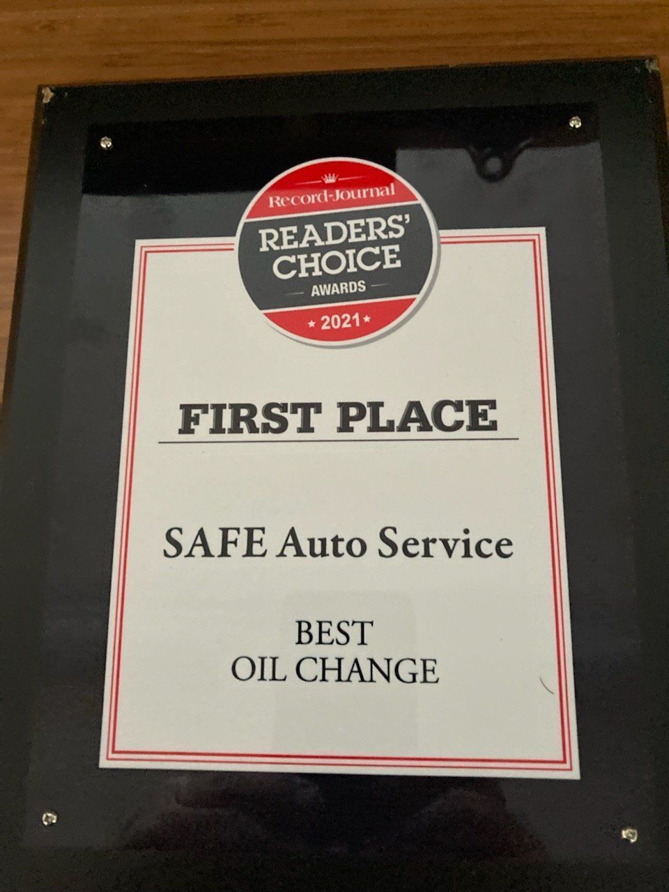 Award plaque: First Place, Best Oil Change. SAFE Auto Service, Readers' Choice Award 2021.
