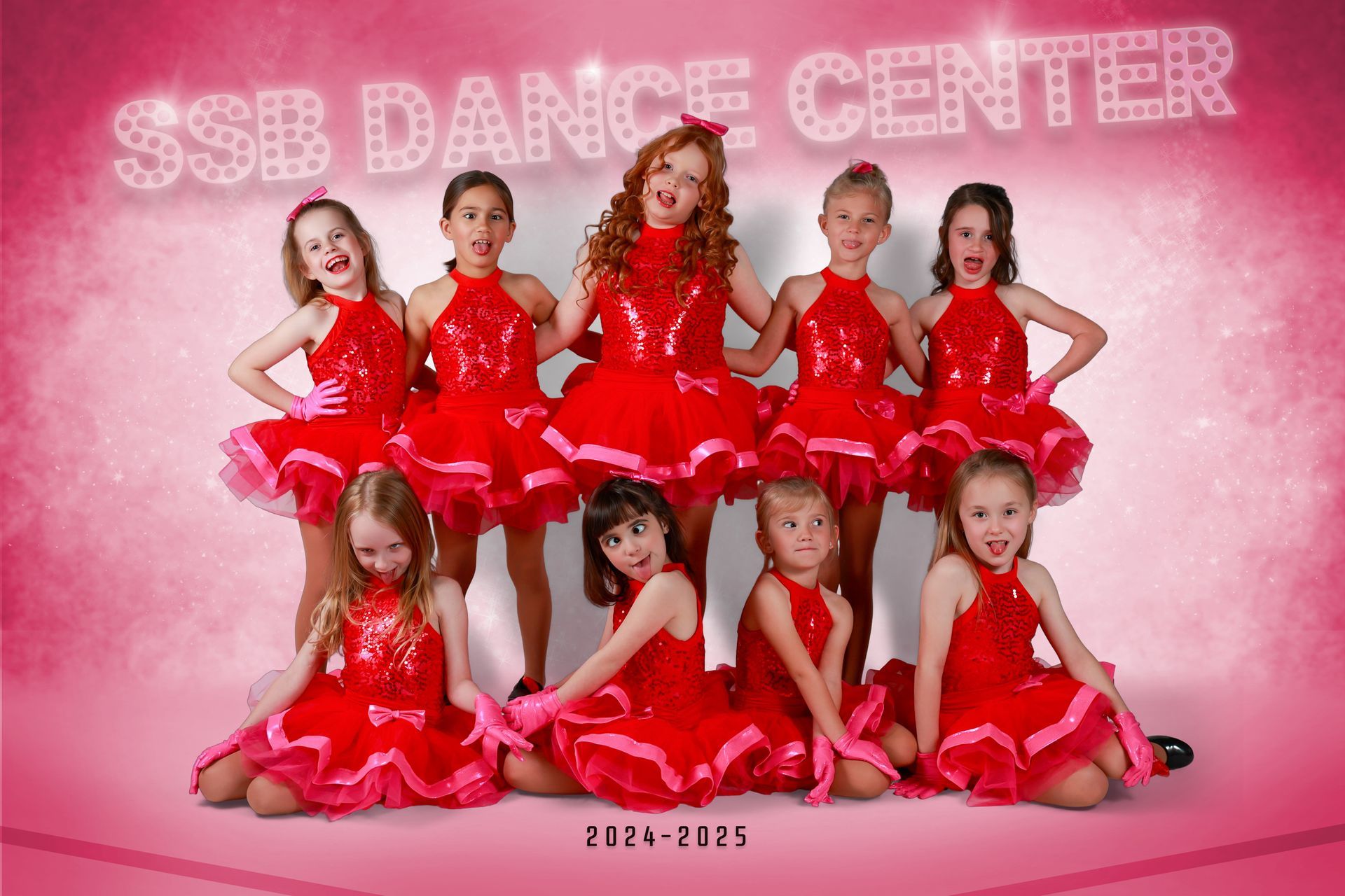 Group of young girls in red sequined dresses posing, SSB Dance Center.