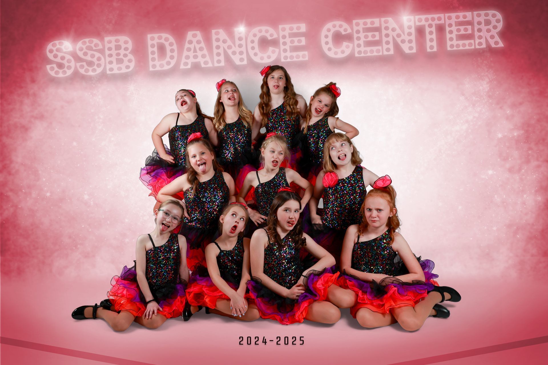 Group photo of SSB Dance Center dancers in black and red sequin outfits, making funny faces.