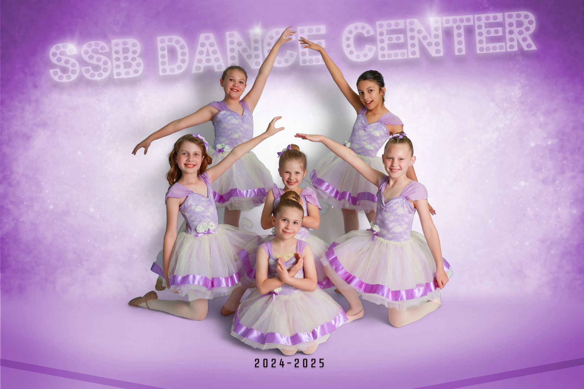 Six young dancers in lavender and white tutus forming an arch, SSB Dance Center.