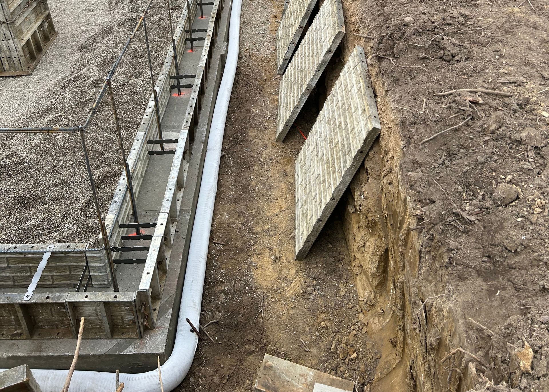A collage of two pictures of a screened in porch with a table and chairs.