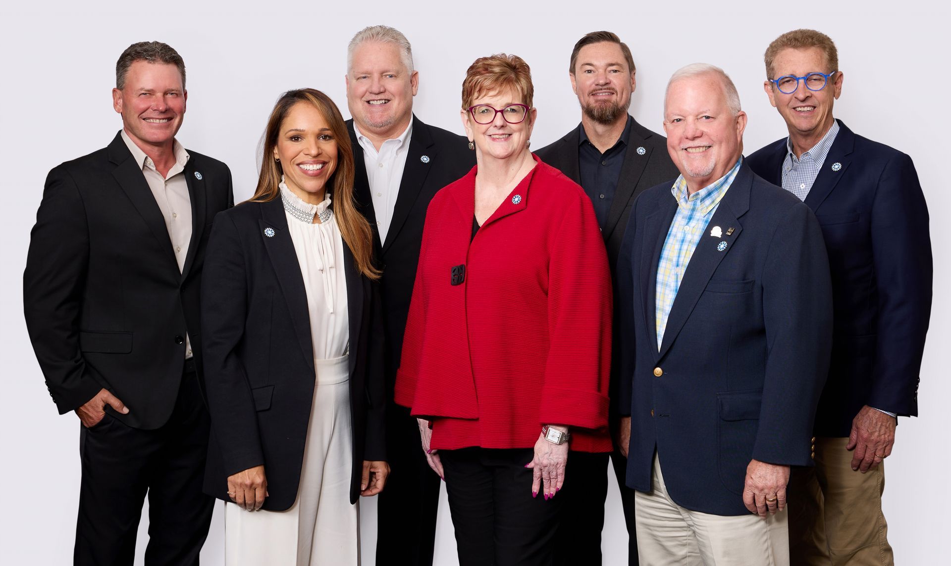 A group of people are posing for a picture together.