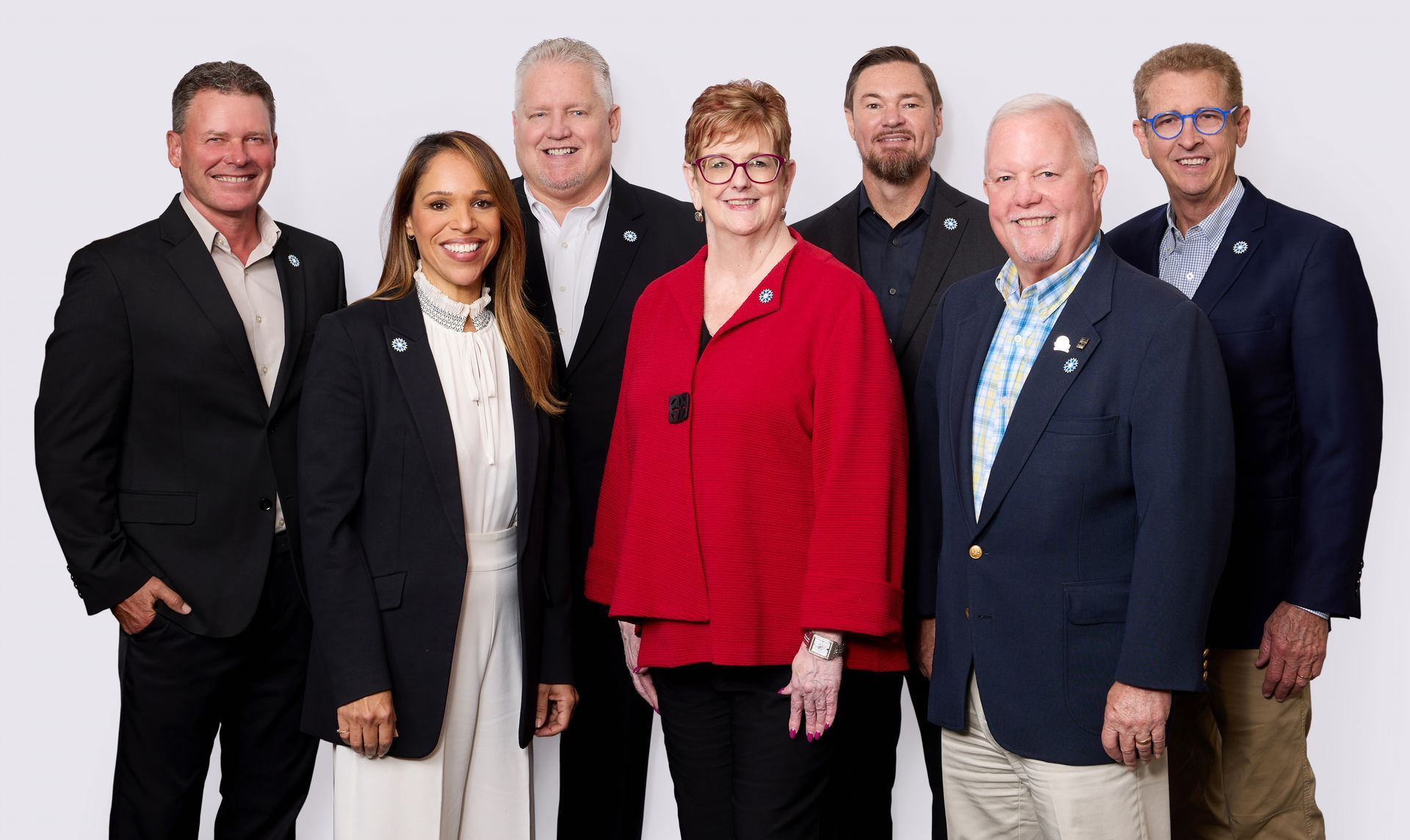 A group of people are posing for a picture together.