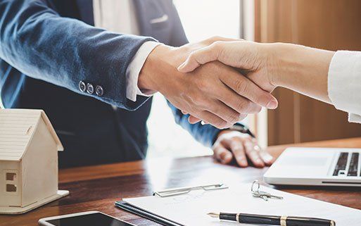 Real Estate Lawyer — Shaking Hands in Reading, PA Real Estate Lawyer — Shaking Hands in Reading, PA