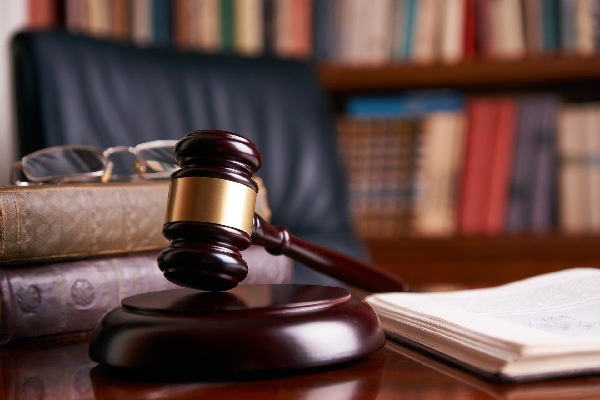Gavel on judge’s table representing motor vehicle accident attorney courtroom proceedings.