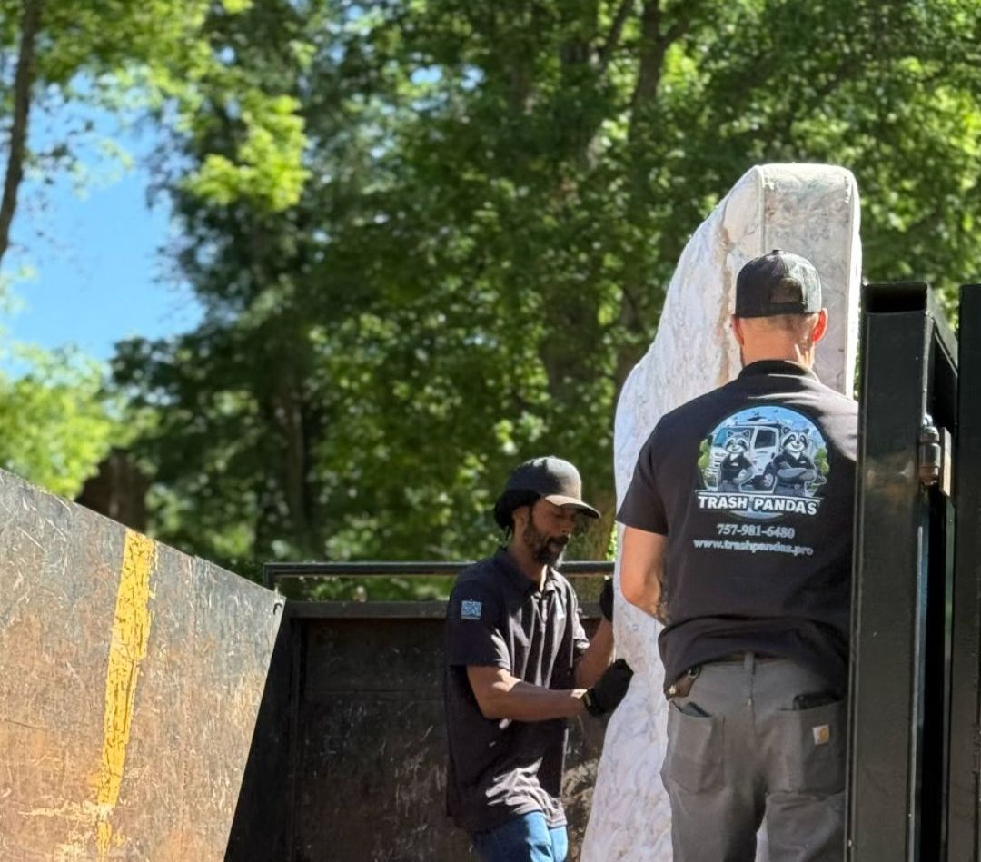 Two businessmen shaking hands in front of a building.