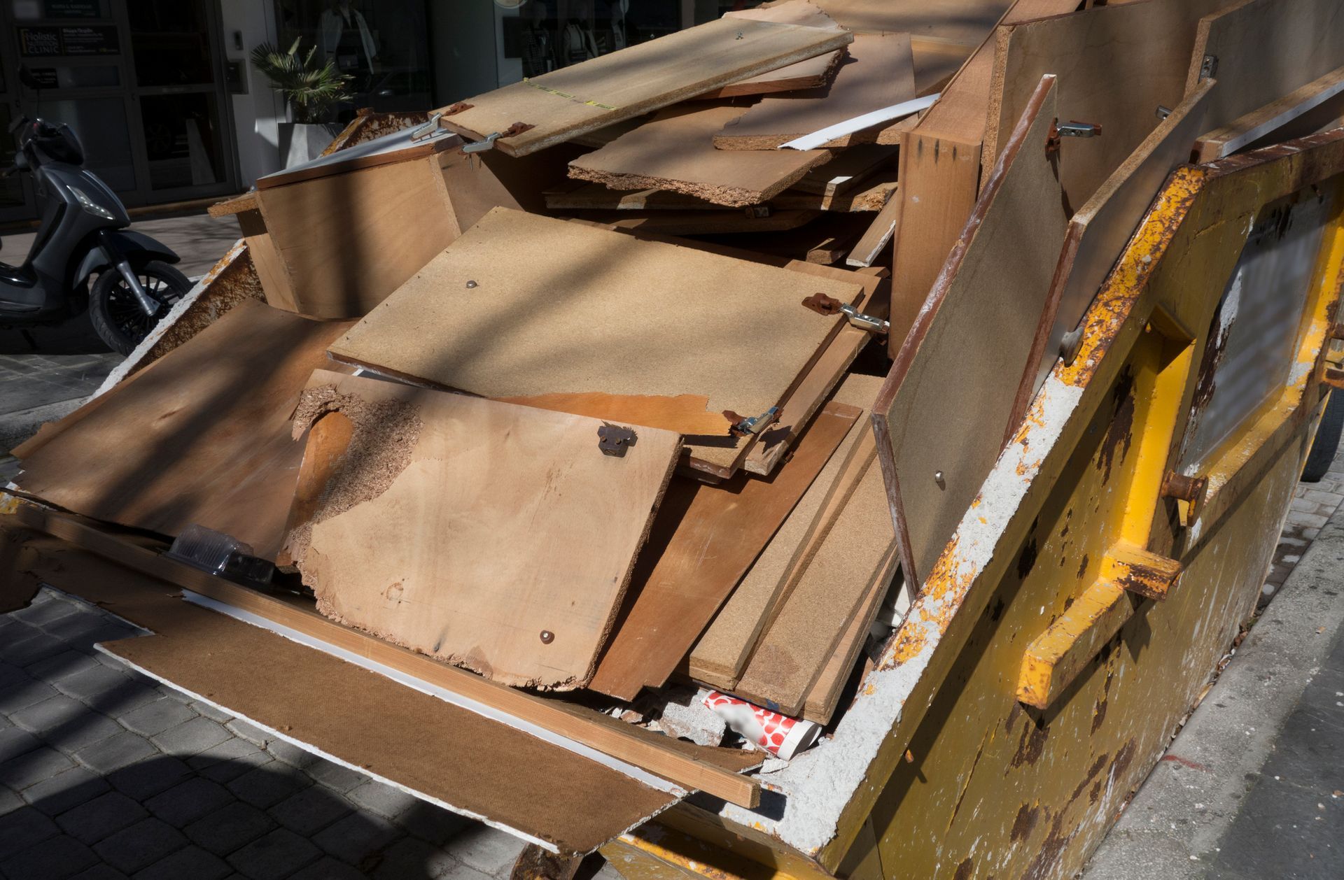 A dumpster filled with junk.