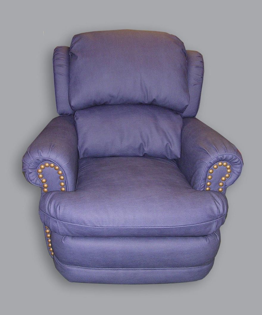 A purple upholstered recliner chair with nailhead trim on the arms, set against a plain gray background.