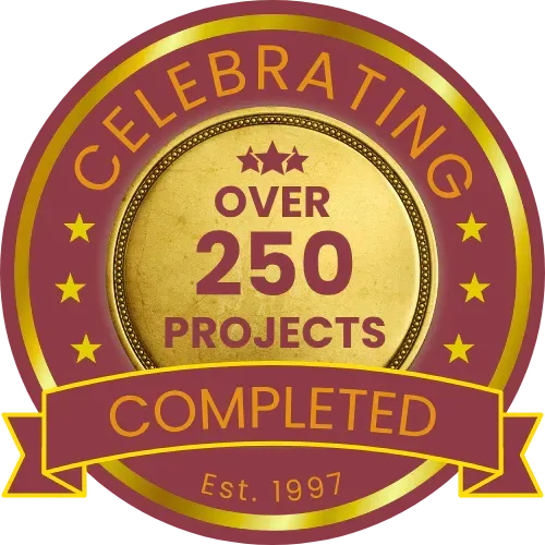 Emblem: Celebrating over 250 completed projects since 1997. Maroon and gold.