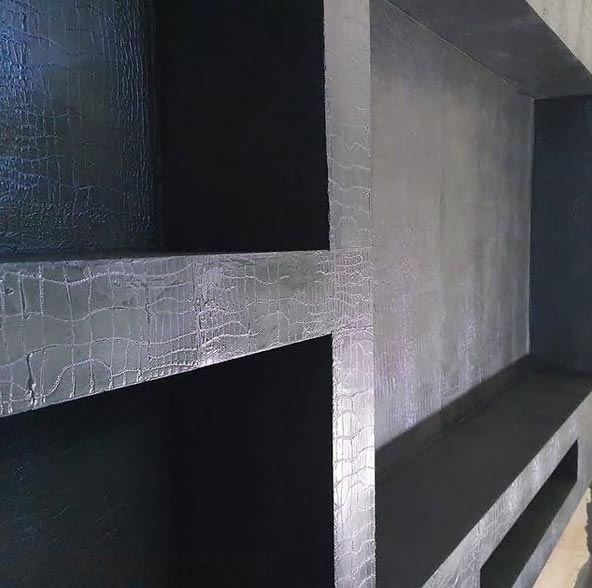 Shelving against venetian plaster