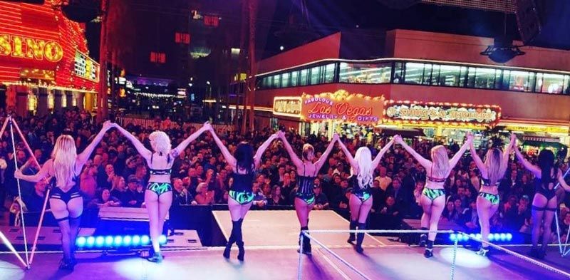 women bowing on stage