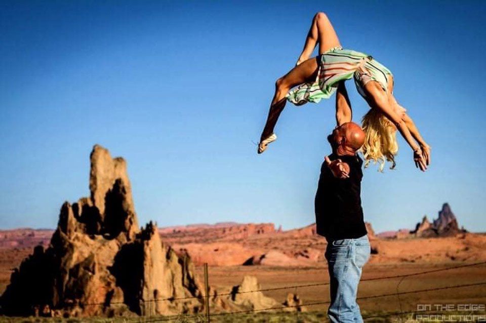 woman being lifted in the air