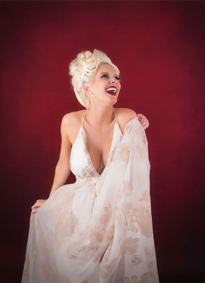 smiling woman in white dress