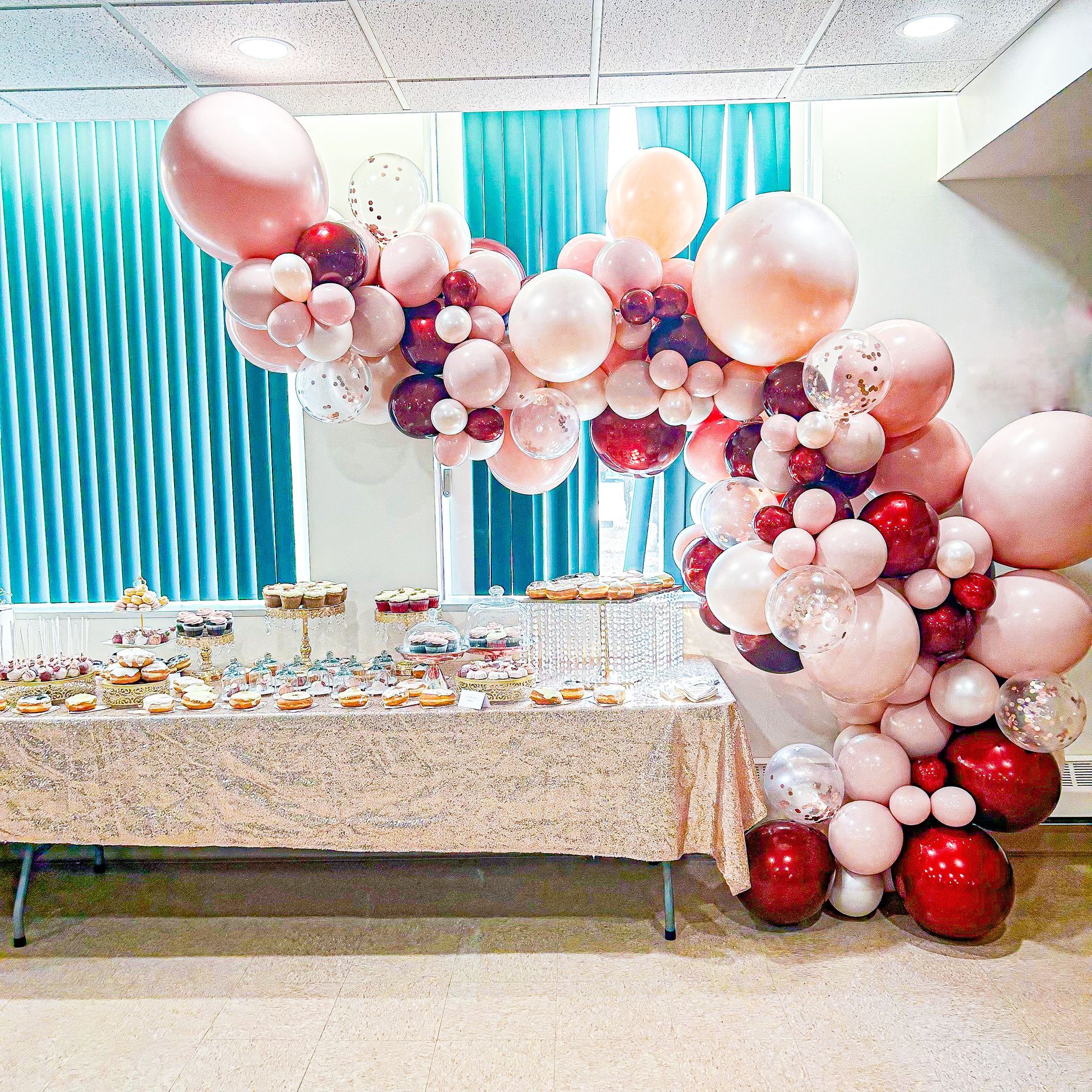 A table with a bunch of balloons on it