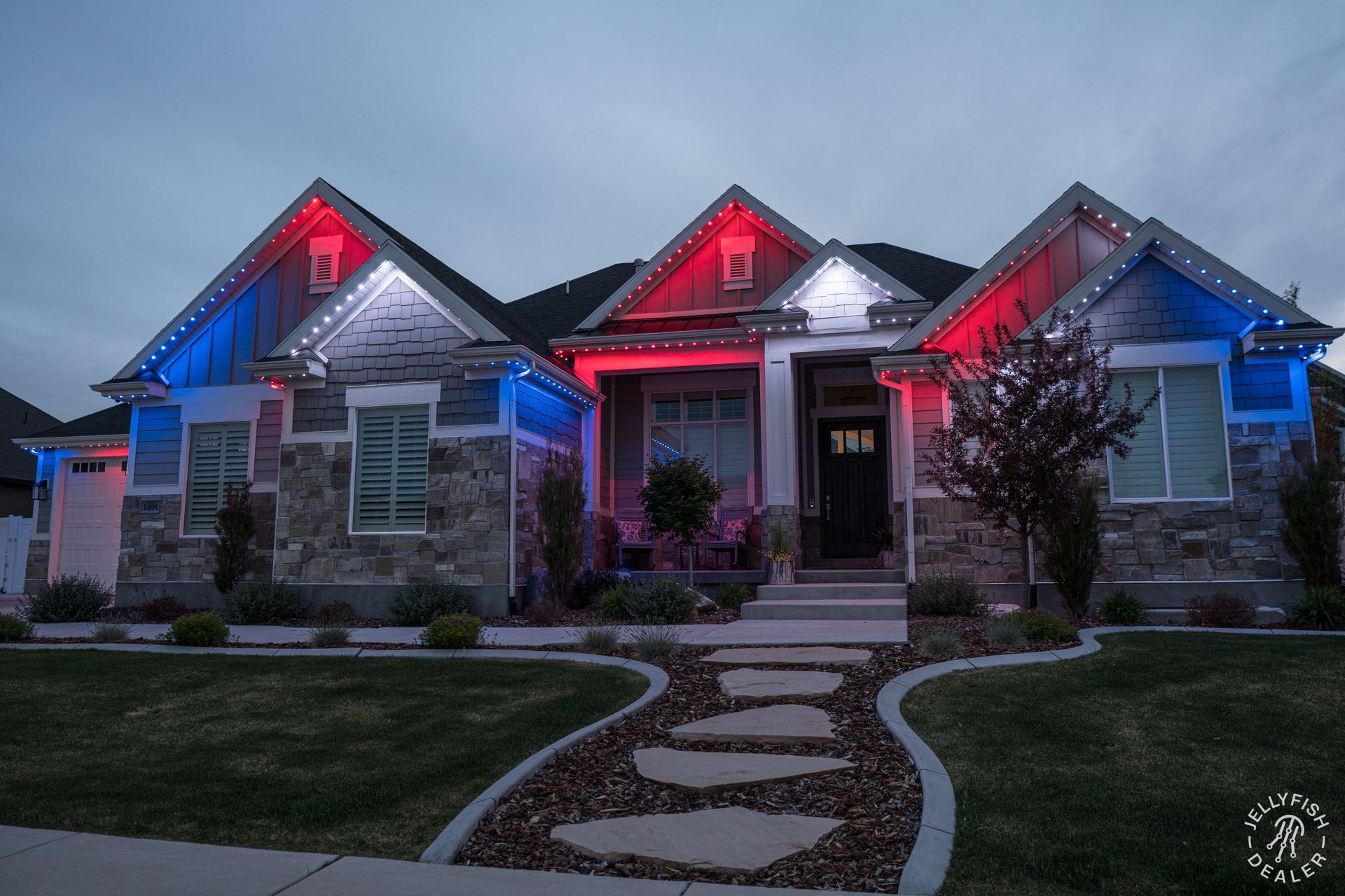 A house with red , white and blue lights on it.