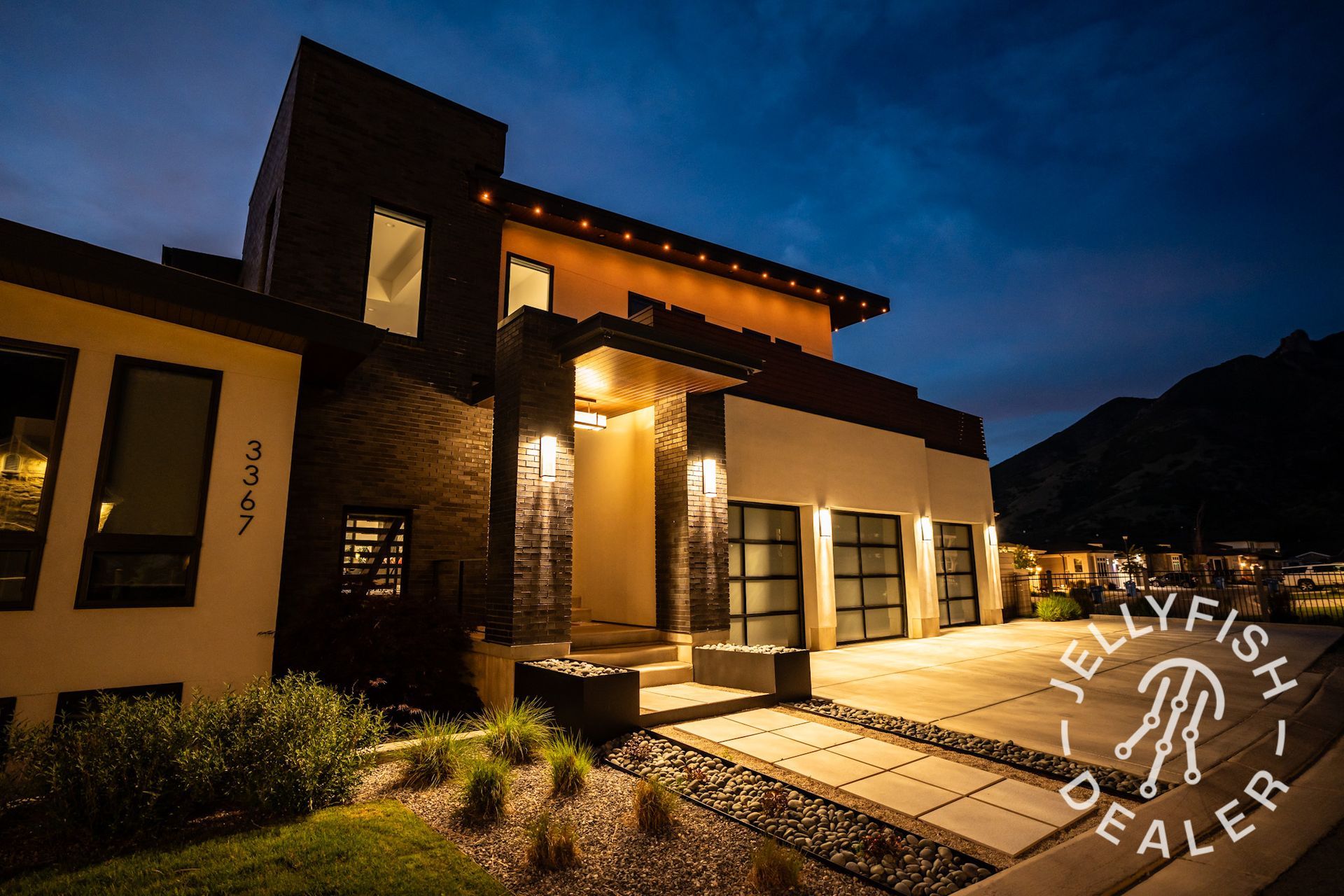 A jellyfish dealer logo is on the side of a house