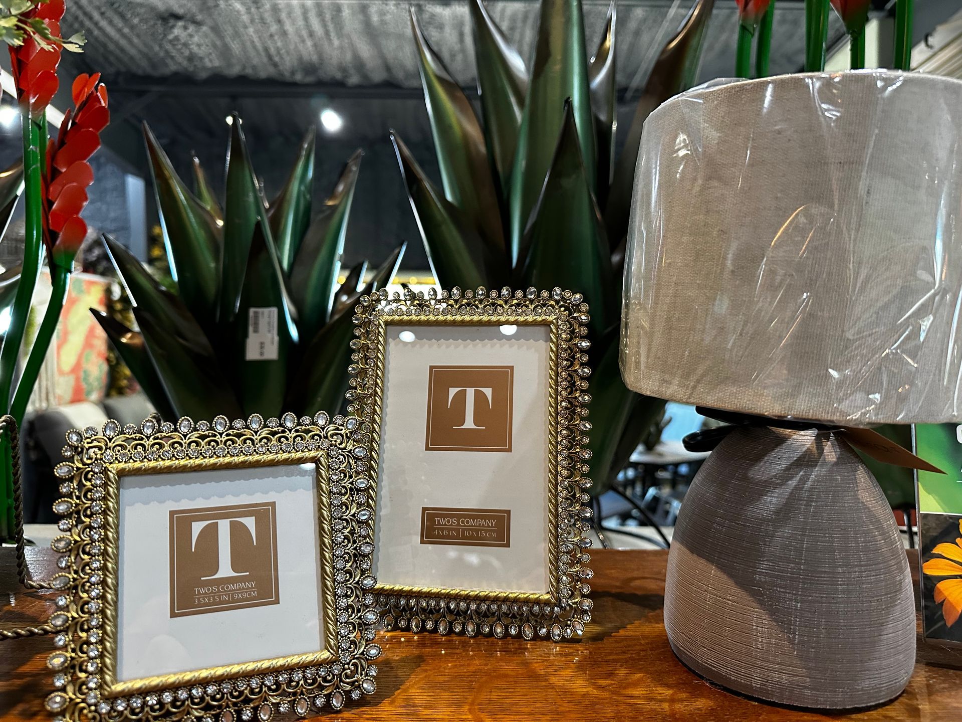 A picture frame with the letter t on it