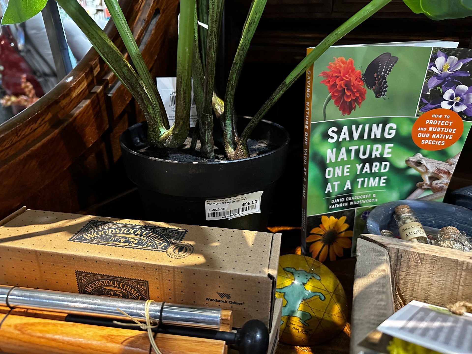 A book titled saving nature one yard at a time