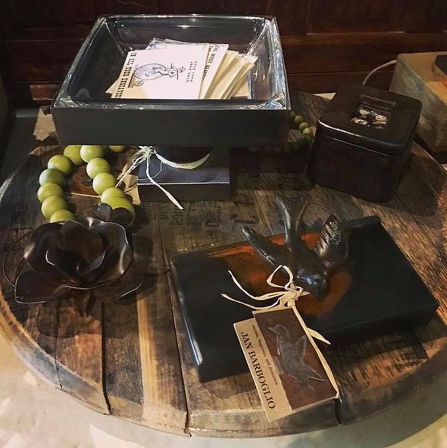 A wooden table with a box that says ' the handyman ' on it