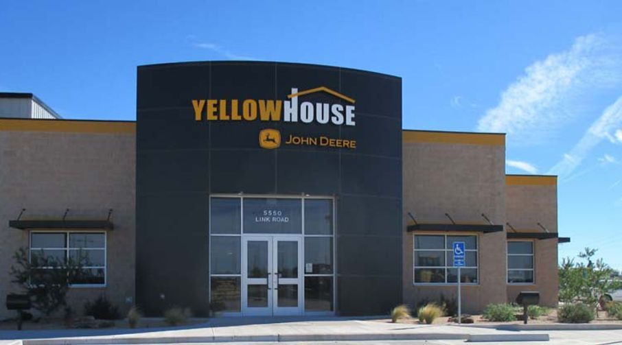 A large building with the word yellowhouse on it