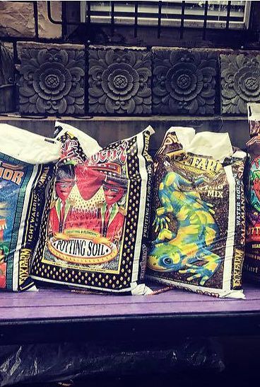 A bunch of bags sitting on top of a table.