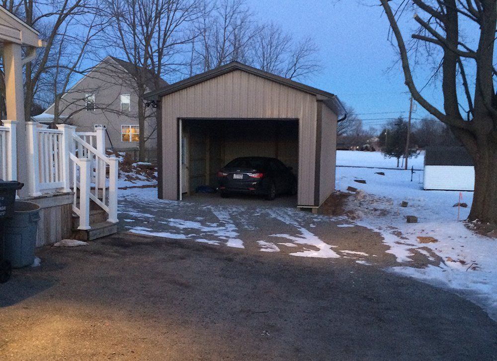 A garage next to a house.