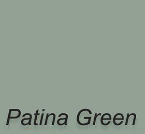 A swatch of patina green paint on a white background.