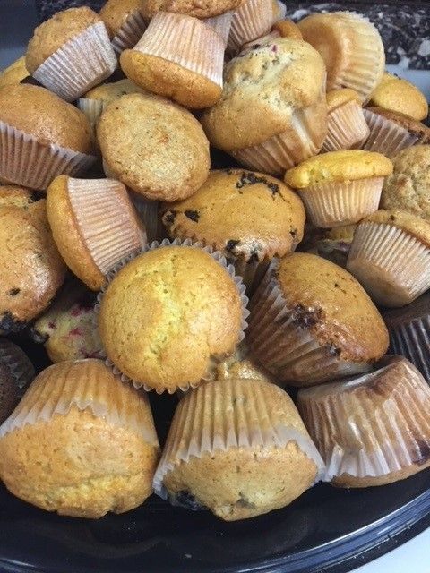 A Tray Of Sandwiches With A Container Of Dipping Sauce - Mahopac, NY - Our Town Bagels & Bakery