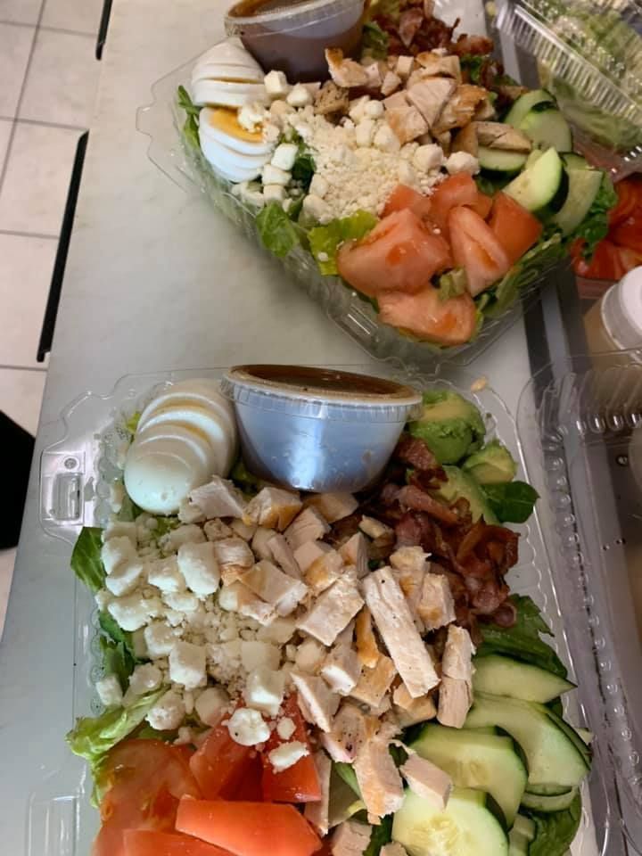 Sandwich Wrapped In White Paper - Mahopac, NY - Our Town Bagels & Bakery