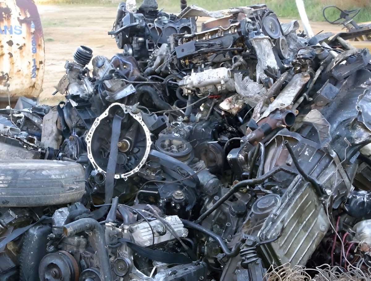 A Pile of Scrap Metal Including a Motorcycle Engine — Anderson Waste Services in Bowral, NSW