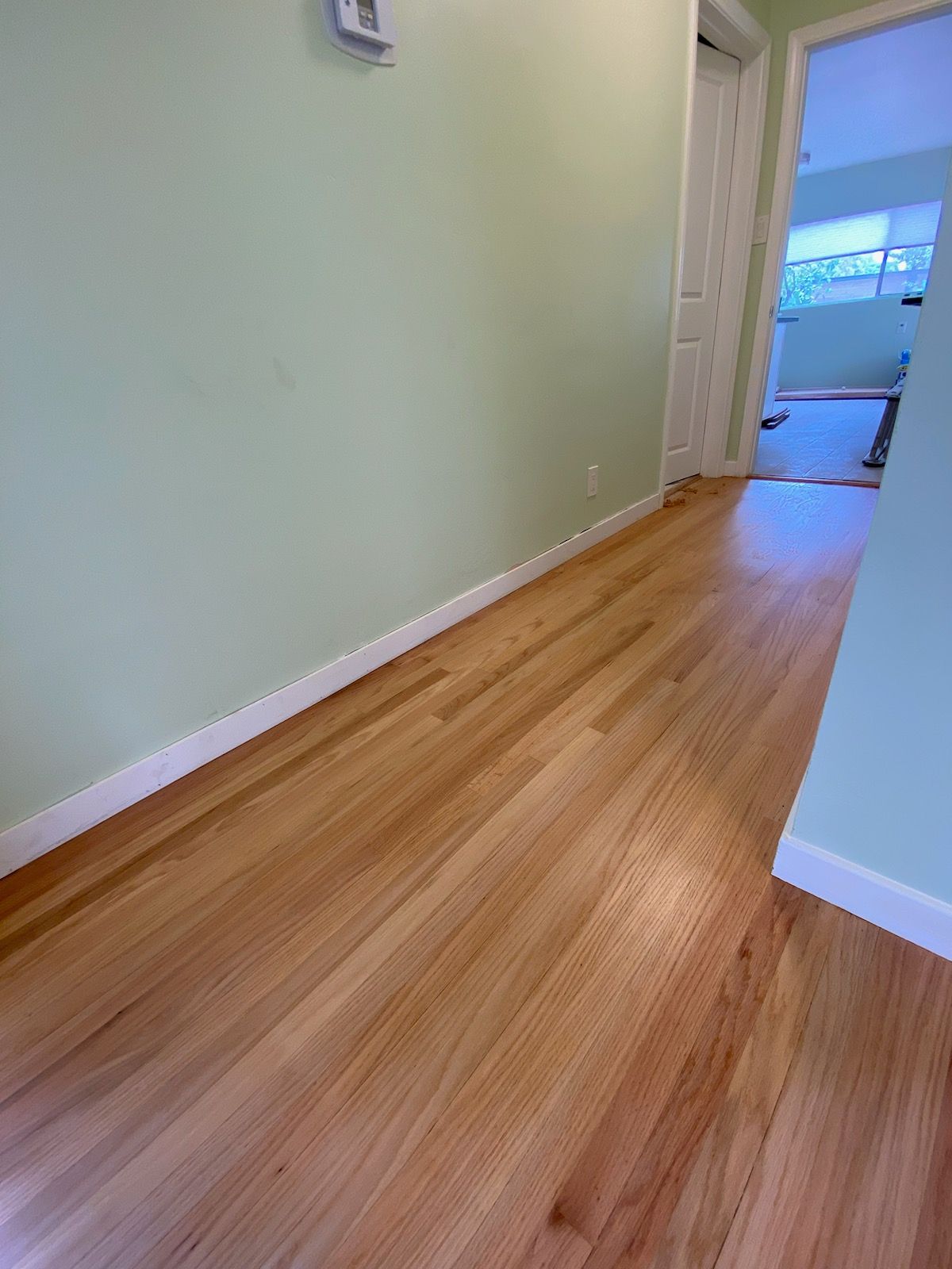 hallway with hardwood refinished surface otay mesa