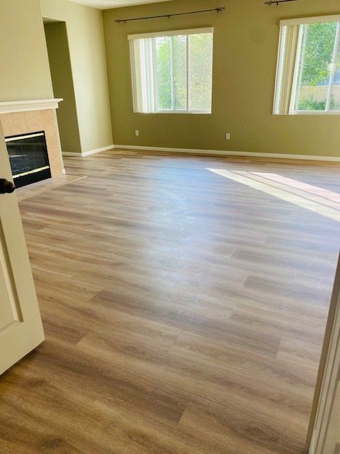 bedroom with fireplace laminate flooring otay mesa