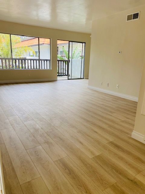 living room in otay mesa with vinyl plank flooring repairs completed beforehand