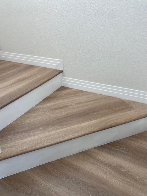 Otay Mesa flooring waterproof laminate stairs with white risers