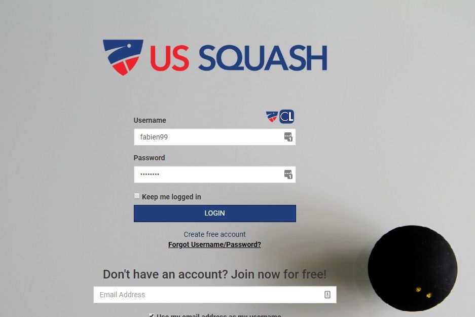 A screenshot of the us squash website with a ping pong ball in the foreground.