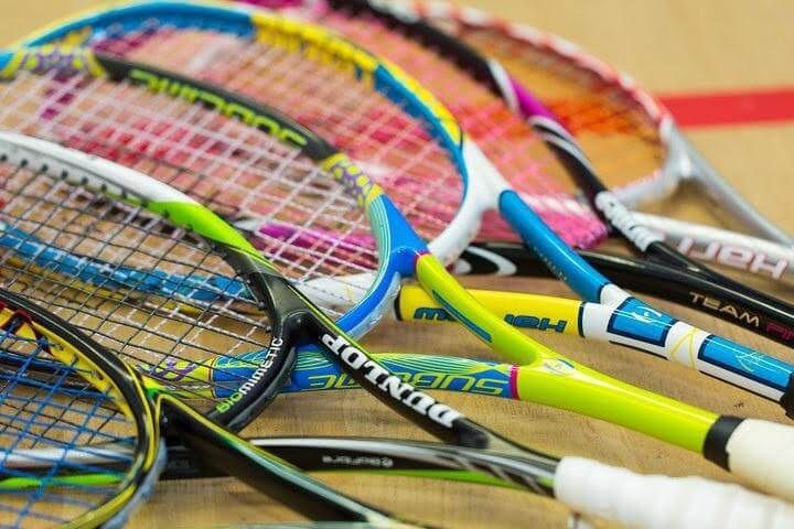 Colorful squash racquets stacked together. for Squash pros shop Orlando florida