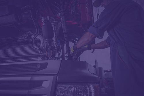 Mechanic working on truck — Mechanic in Cairns QLD