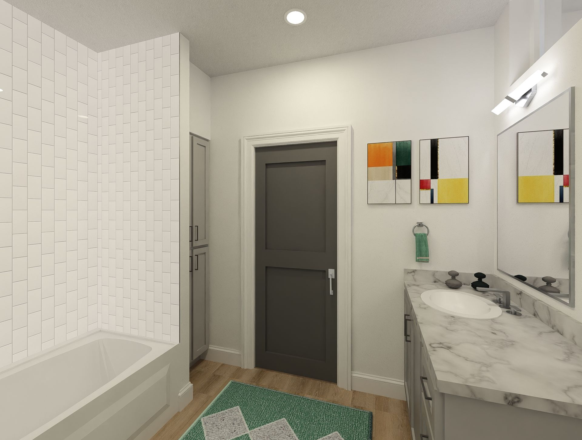 Bathroom with a bathtub, vanity, and a gray door. White and green geometric rug on the floor.