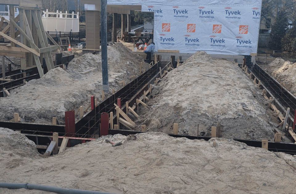 A construction site with a tarp that says tyvek on it